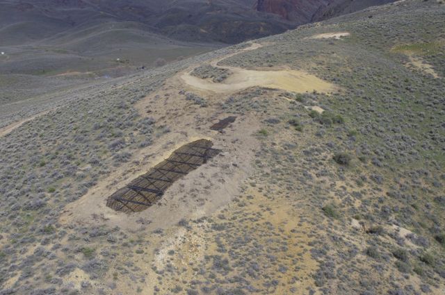 Aerial view of a grate installed over the top of an abandoned mine shaft in Nevada.