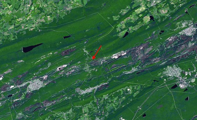 NASA ASTER satellite image of the Centralia area acquired August 24, 2003, with open pit coal mines dotting the landscape for miles around.