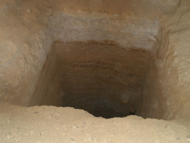 An open abandoned mine shaft at Phantom Falls.