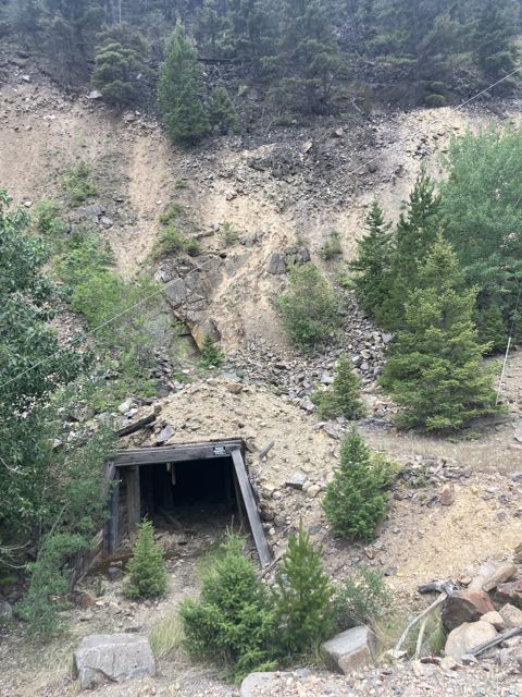 An exposed shaft and mine dump at an abandoned mine outside Boulder, Montana.